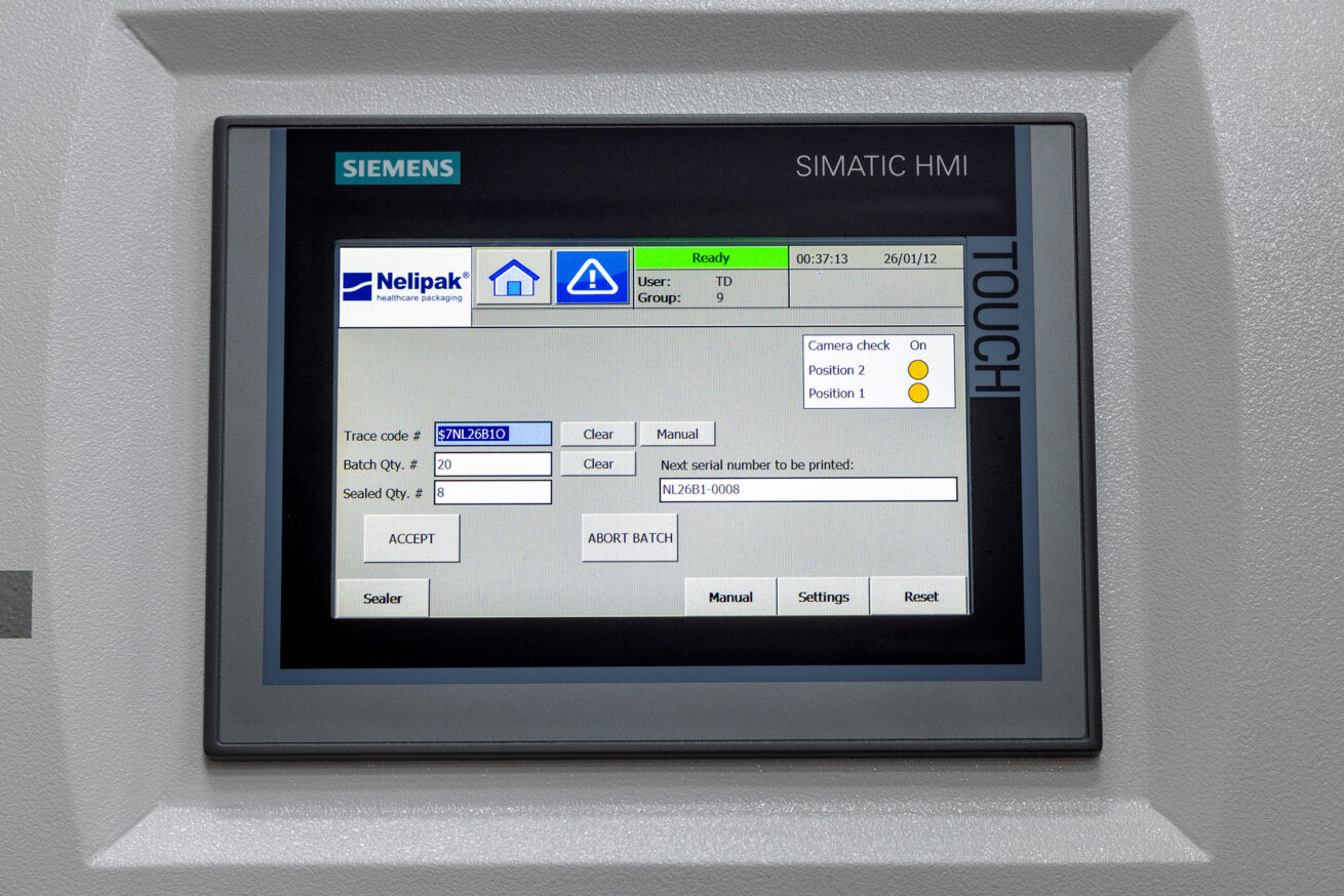 NX-B Rotary Sealer met printstation met Nelipak