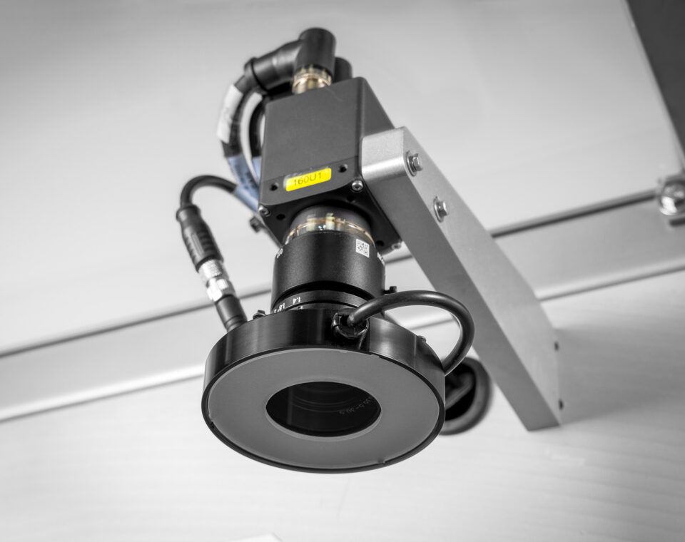 Lid punching machine vision check